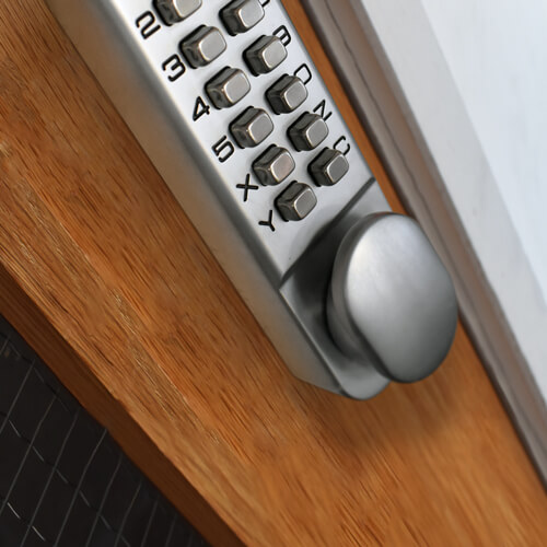 Combination code digital lock on wooden internal door
